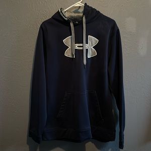 Navy blue with silver accents. Great gently used sweatshirt.